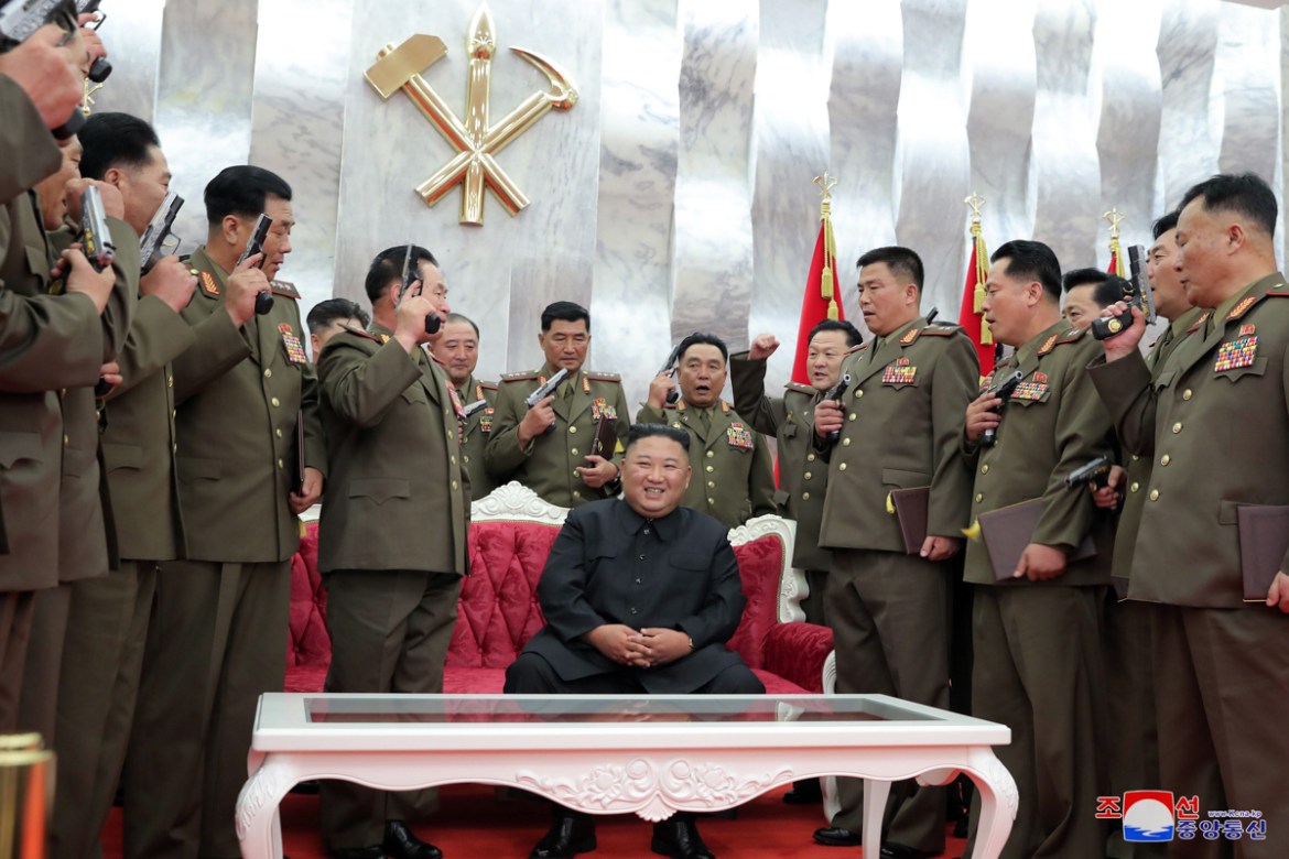 epa08568098 A photo released by the official North Korean Central News Agency (KCNA) shows Kim Jong-Un (C), chairman of the Workers'' Party of Korea, chairman of the State Affairs Commission of the Dem