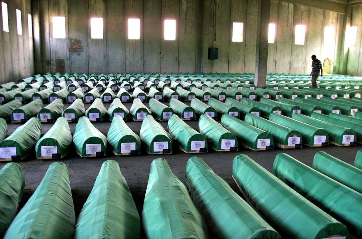 Coffins containing the remains of 282 identified victims of the 1995 Srebrenica slaughter of up to 8,000 Muslim men and boys by Bosnian Serb forces await burial in a former battery factory on July 10,