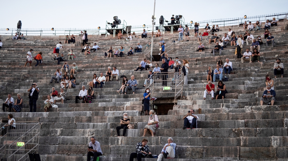 Guests take their seats before a concert at the Arena in Verona, northern Italy, on July 25, 2020. This is the first show with new dispositions against the spread of the novel coronavirus (Covid-19) d