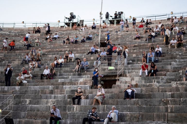 Guests take their seats before a concert at the Arena in Verona, northern Italy, on July 25, 2020. This is the first show with new dispositions against the spread of the novel coronavirus (Covid-19) d