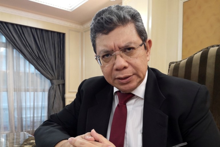 FILE PHOTO: Malaysian Foreign Minister Saifuddin Abdullah speaks during an interview with Reuters in Kuala Lumpur