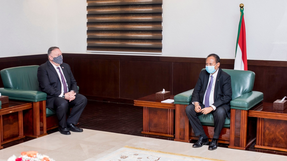 A handout picture provided by Sudan's Prime Ministers office on August 25, 2020, shows US Secretary of State Mike Pompeo (L) meeting with Sudanese Prime Minister Abdalla Hamdok (R) in Khartoum. Pompeo