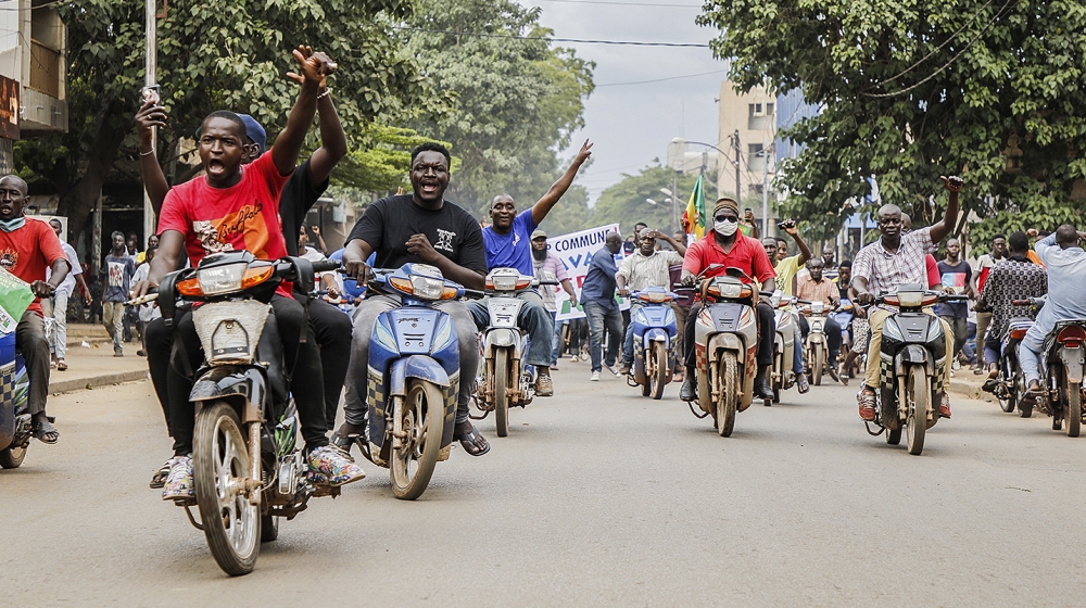 Malians react after Mali military entered the streets of Bamako, Mali, 18 August 2020. Local reports indicate Mali military have seized Mali President Ibrahim Boubakar Keïta in what appears to be a co