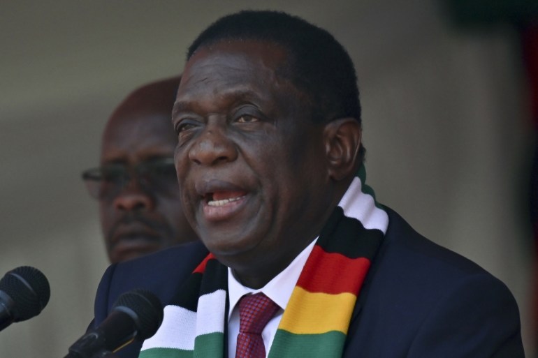 Zimbabwe''s President Emmerson Mnangagwa delivers a speech during a farewell ceremony for late the Zimbabwean President Robert Mugabe, held for family and heads of state at the National Sports Stadium
