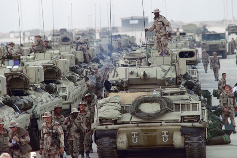 (FILES) In this file photo taken on August 28, 1990, US Army tanks from the 24th Infantry Division are unloaded during military manoeuvres in Saudi Arabia as US army was deployed in the Persian Gulf s