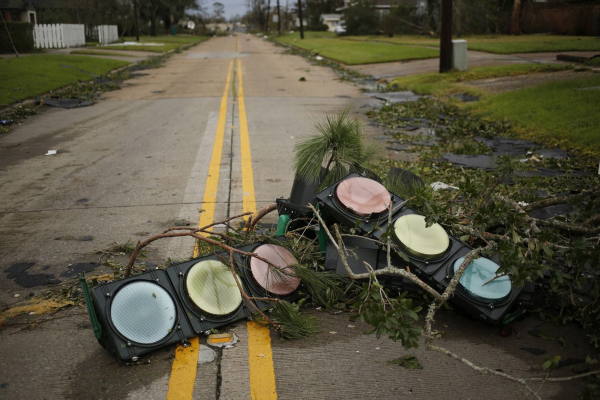 Damaged traffic signals lay in a road after Hurricane Laura made landfall in Lake Charles, Louisiana, U.S., on Thursday, Aug. 27, 2020. Hurricane Laura raked across Louisiana early on Thursday, becomi