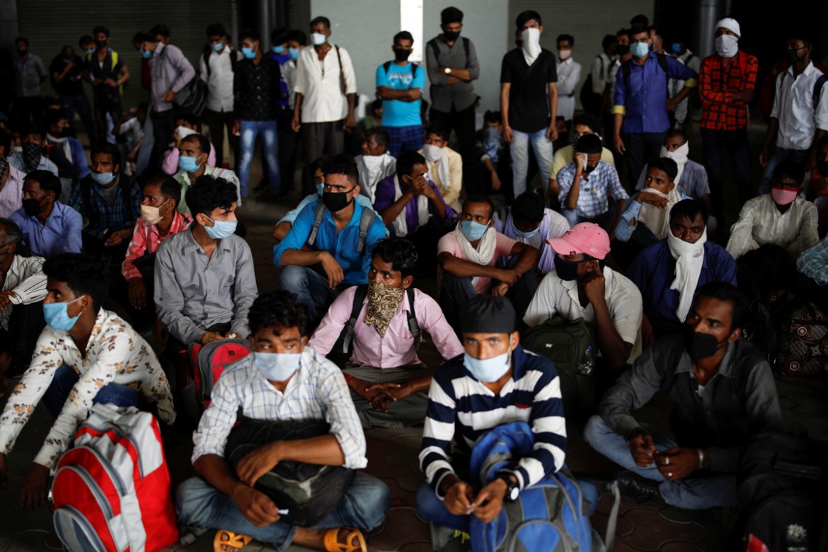 In Pictures: Migrants return to Delhi as COVID-19 deaths soar | India | Al Jazeera