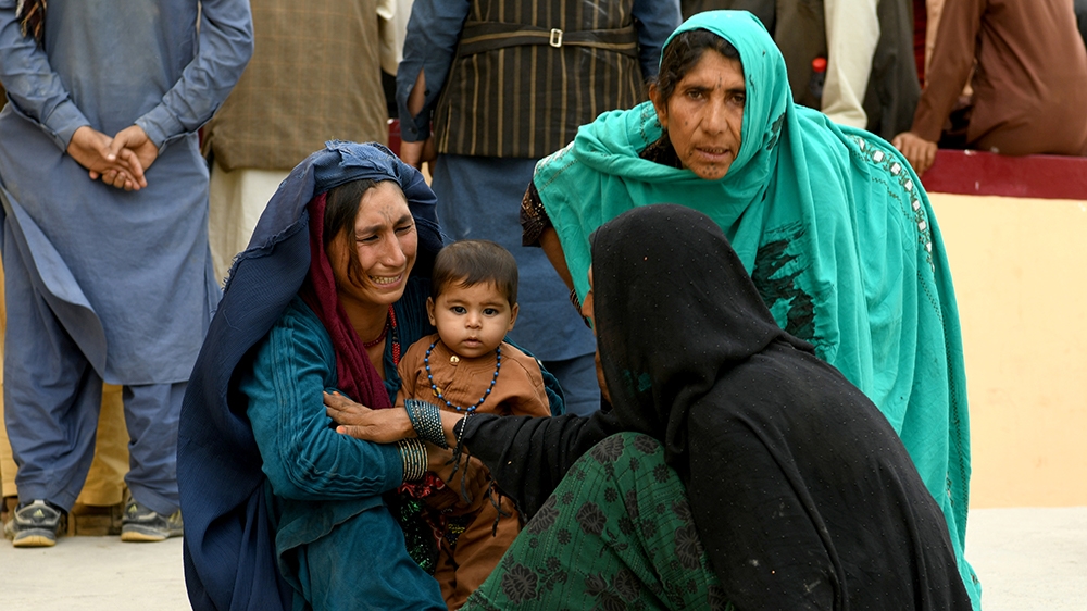 Relatives react in front of a hospital, where their family member has been transferred for treatment after a truck bomb blast in Balkh province, in Mazar-i-Sharif, Afghanistan August 25, 2020. REUTERS