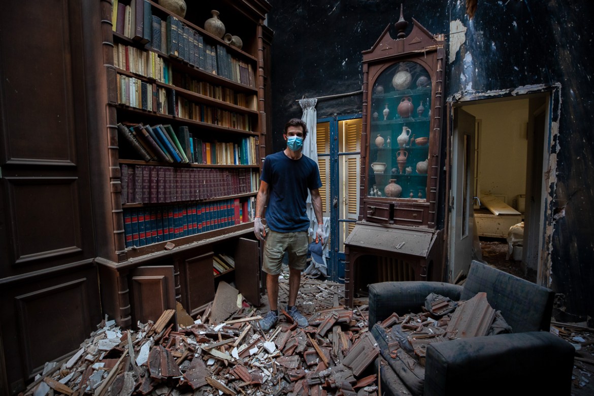 Said Al Assaad, 24, poses for a photograph inside his grandfather''s destroyed villa after Tuesday''s explosion in the seaport of Beirut, Lebanon, Thursday, Aug. 6, 2020. The gigantic explosion in Beiru