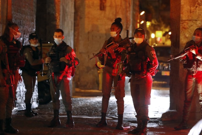 Israeli security forces gather at Lion''s gate in the Old City of Jerusalem on August 17, 2020 following a reported stabbing attack. Ahmad GHARABLI / AFP