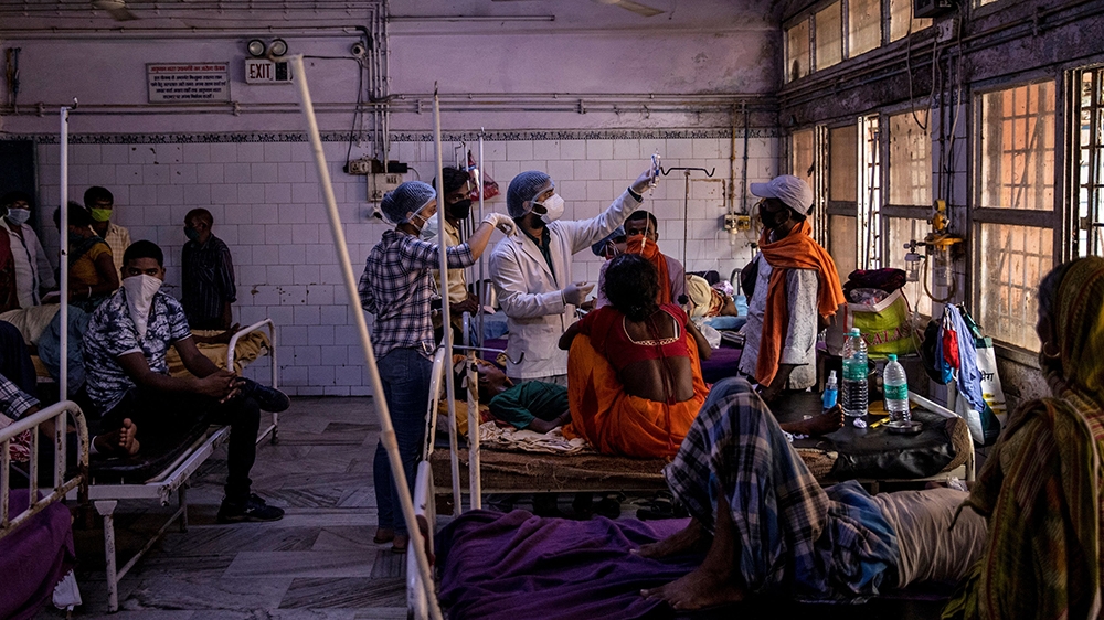 Medical staff treat a patient inside the emergency ward of Jawahar Lal Nehru Medical College and Hospital, during the coronavirus disease (COVID-19) outbreak, in Bhagalpur, Bihar, India, July 27, 2020