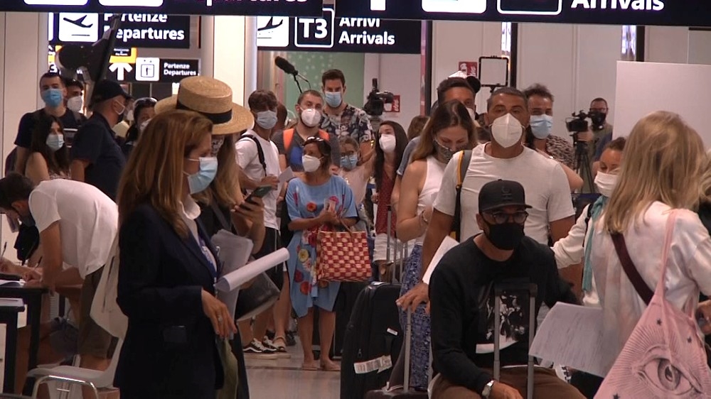 Passengers queue to take new coronavirus disease (COVID-19) tests at Rome's Fiumicino airport, Italy, August 16, 2020, in this still image taken from video. Aeroporti di Roma/Handout via REUTERS
