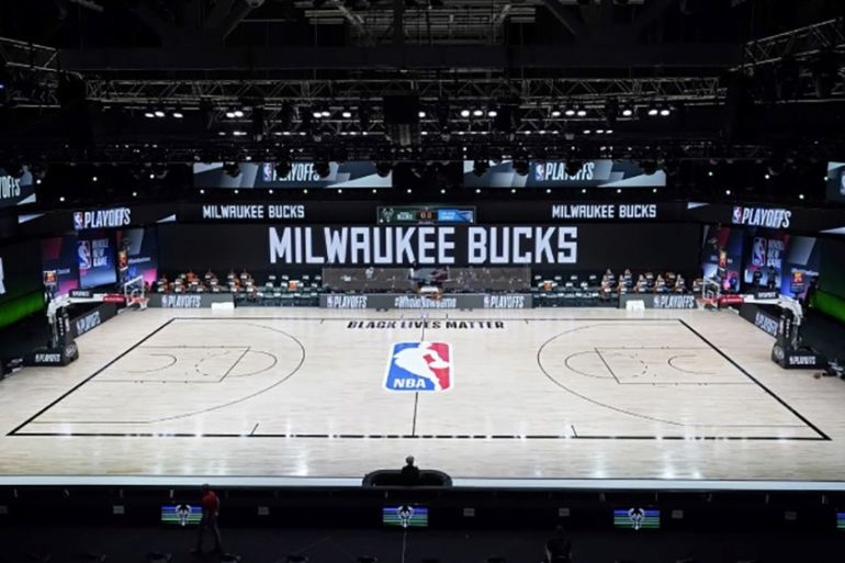 Lake Buena Vista, Florida, USA; The court and benches are empty of players and coaches at the scheduled start of an NBA basketball first round playoff game between the Milwaukee Bucks and the Orlando