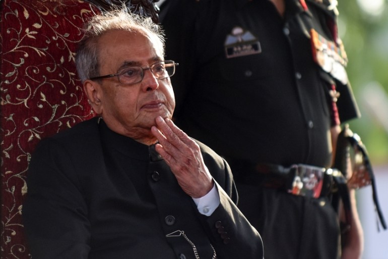 In this file photo taken on September 10, 2016 the then India''s President Pranab Mukherjee reviews a passing out parade of cadets during their graduation ceremony at the Officers Training Academy in C