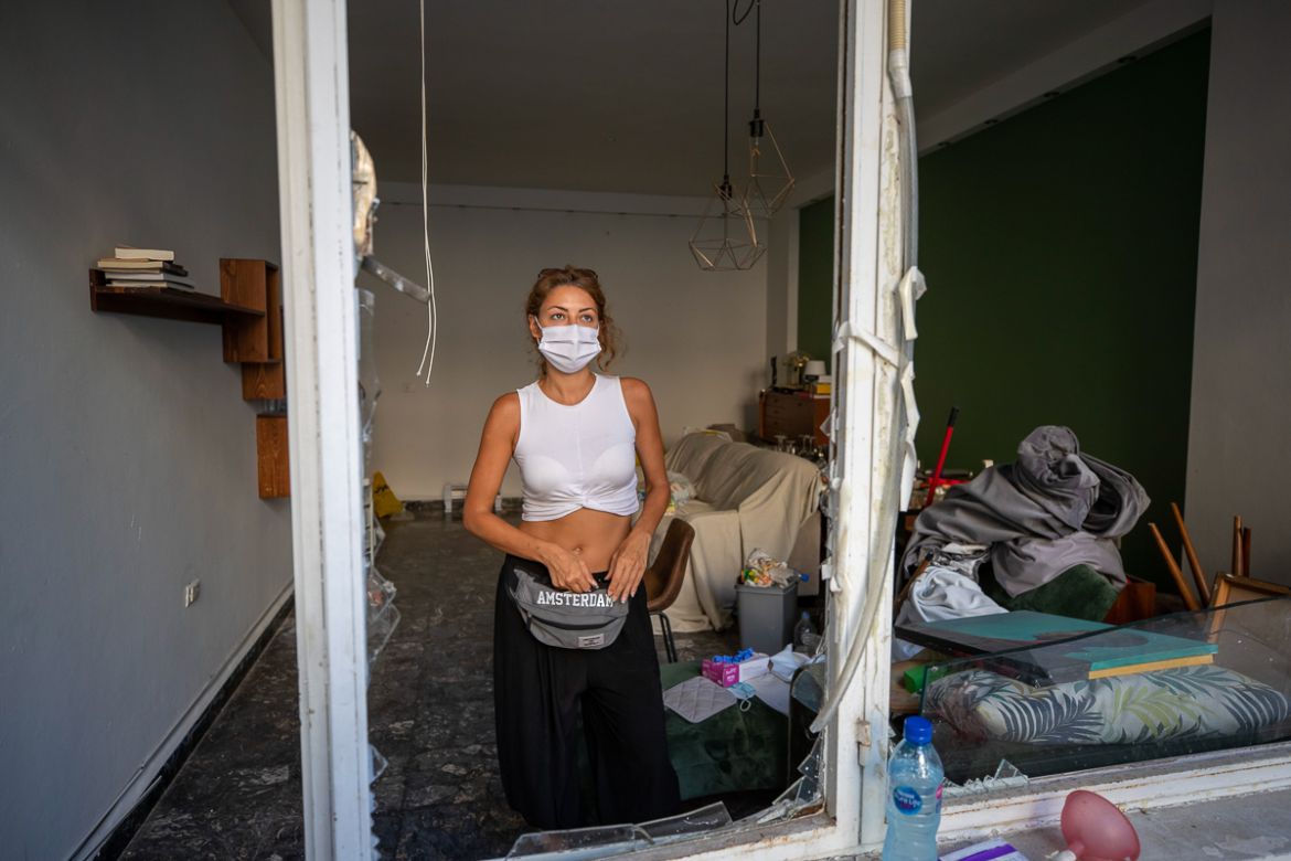 Sandrine Zeinoun, 34, poses for a photograph inside her destroyed apartment after Tuesday''s explosion in the seaport of Beirut, Lebanon, Thursday, Aug. 6, 2020. The gigantic explosion in Beirut on Tue