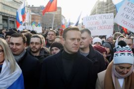Russian opposition politician Alexei Navalny, his wife Yulia and opposition figure Lyubov Sobol take part in a rally to mark the 5th anniversary of opposition politician Boris Nemtsov''s murder