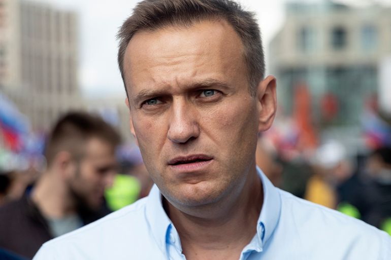 FILE In this file photo taken on Saturday, July 20, 2019, Russian opposition activist Alexei Navalny attends a protest in Moscow, Russia. Russian opposition leader Alexei Navalny remained hospitalized