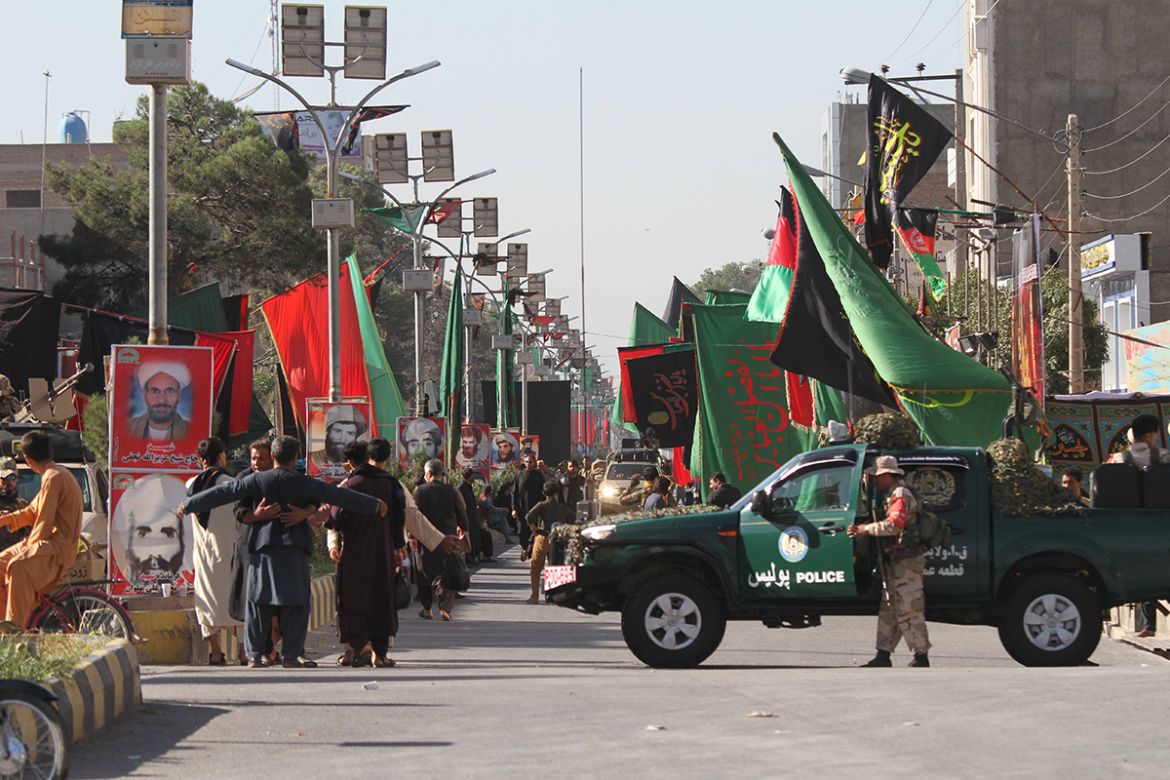 epa08634125 Afghani Shiite Muslims attend a mourning procession in Islamic sacred month of Muharram, in Herat, Afghanistan, 29 August 2020. S?hiite Muslims are observing the holy month of Muharram, th