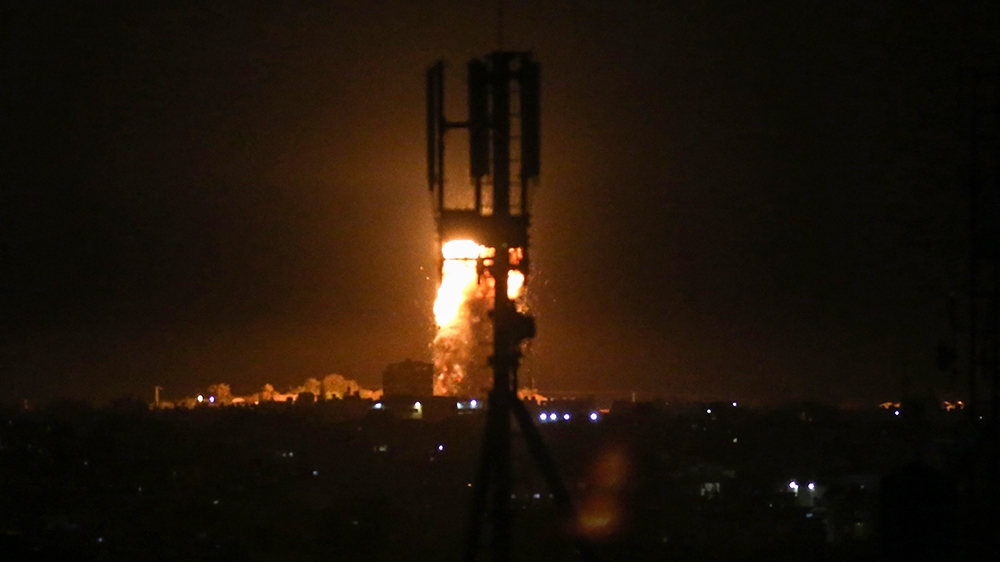A ball of fire is seen following an Israeli airstrike on Rafah in the southern Gaza Strip early on August 3, 2020. - Israeli fighter jets carried out strikes on Hamas facilities in Gaza after a 