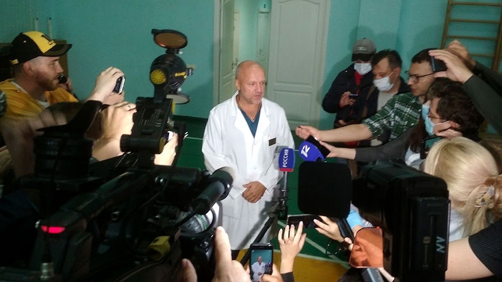Anatoliy Kalinichenko, deputy chief doctor of the Omsk hospital of intensive care where Alexei Navalny is hospitalized speaks to the media in Omsk, Russia, Thursday, Aug. 20, 2020.  Russian opposition