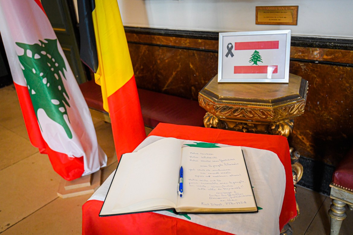 A book of condolence for victims of Beirut blast, is displayed at Brussels city hall, on August 5, 2020, a day after a powerful explosion tore through Lebanon''s capital, resulting from the ignition of