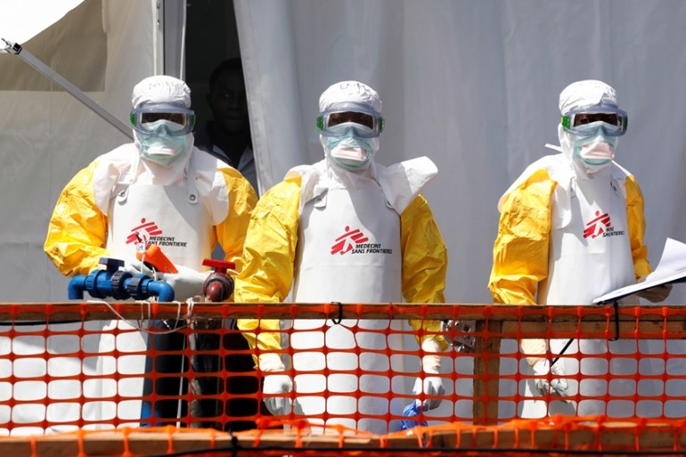 Health workers dressed in protective suits are seen at the newly constructed MSF(Doctors Without Borders) Ebola treatment centre in Goma, Democratic Republic of Congo