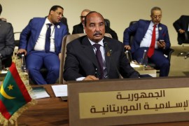 Mauritania''s President Mohamed Ould Abdel Aziz, center, attends the Arab Economic and Social Development Summit, in Beirut, Lebanon. Mauritanians are going to the polls on Saturday, June 22, 2019, as