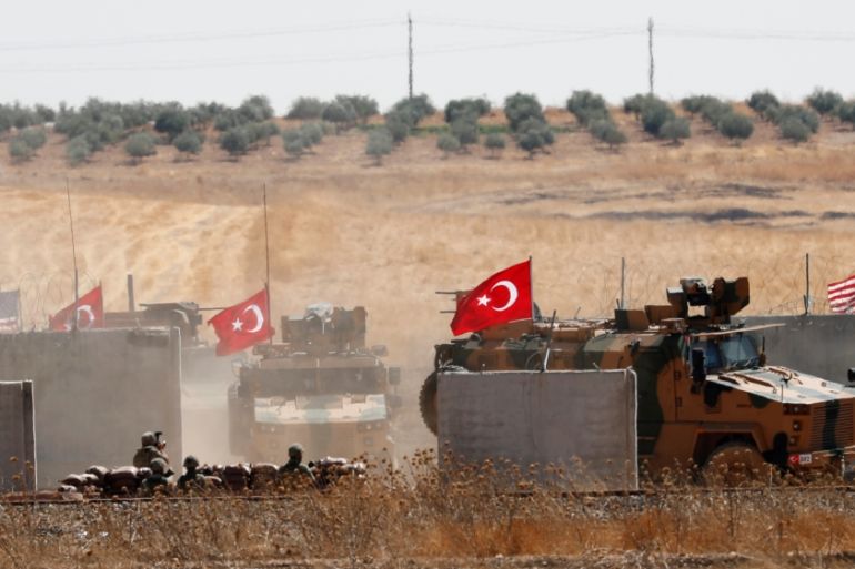 Turkish troops return after a joint U.S.-Turkey patrol