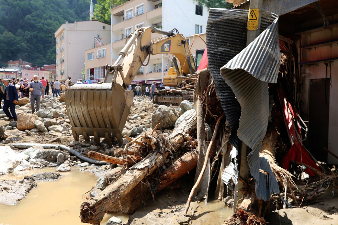 People inspect the destruction after floods caused by heavy rain in the mountain town of Dereli in Giresun province, along Turkey''s Black Sea coastline, Sunday, Aug. 23, 2020. The interior minister sa