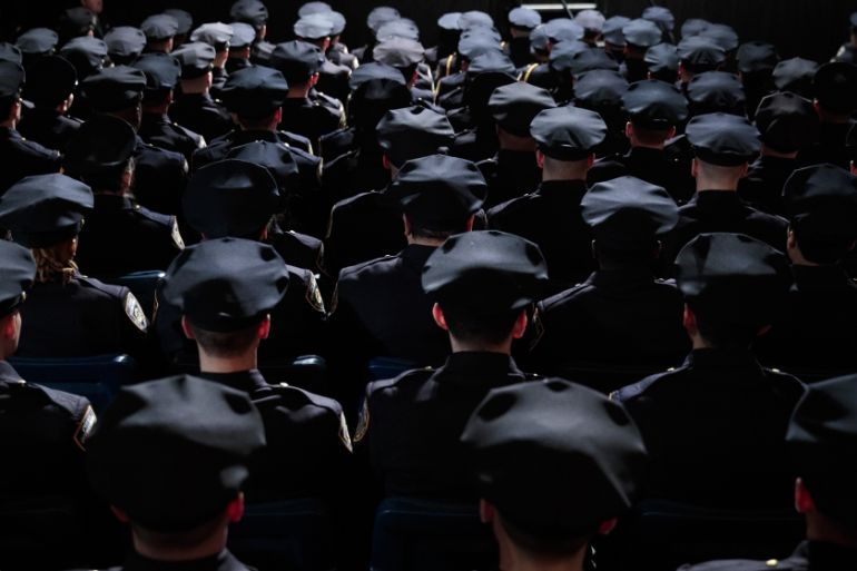 The newest members of the New York City Police Department (NYPD) attend their police academy graduation ceremony at the Theater at Madison Square Garden, March 30, 2017 in New York City. Over 600 new