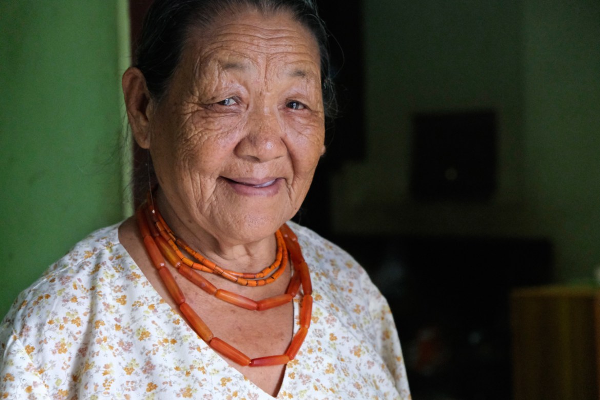 Khriepra-u Rutsa, an 85-year-old Angami Naga woman, smiles as she speaks about her experiences as a young girl during the battle between the Japanese and British Commonwealth forces in her village in