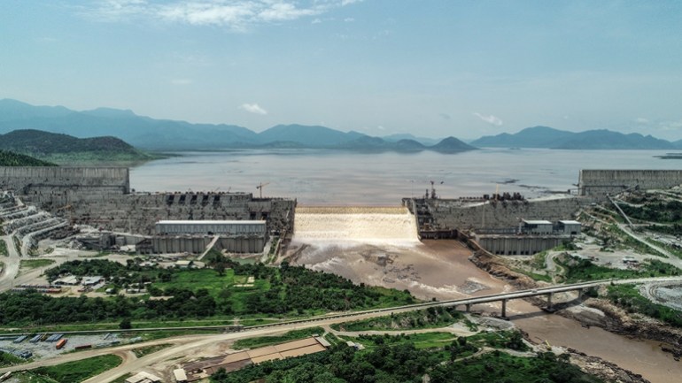 This handout picture taken on July 20, 2020, and released by Adwa Pictures on July 27, 2020, shows an aerial view Grand Ethiopian Renaissance Dam on the Blue Nile River in Guba, northwest Ethiopia. -