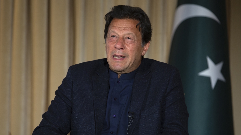 Pakistan's Prime Minister Imran Khan speaks to The Associated Press, in Islamabad, Pakistan, Monday, March 16, 2020. Khan said Monday he fears the new coronavirus will devastate developing nations' ec