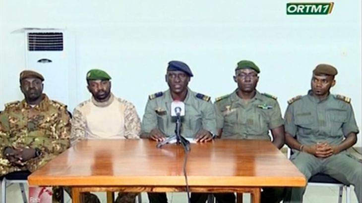 Speaking on national broadcaster ORTM TV, Colonel-Major Ismael Wague, centre, spokesman for the soldiers identifying themselves as National Committee for the Salvation of the People, announce that the