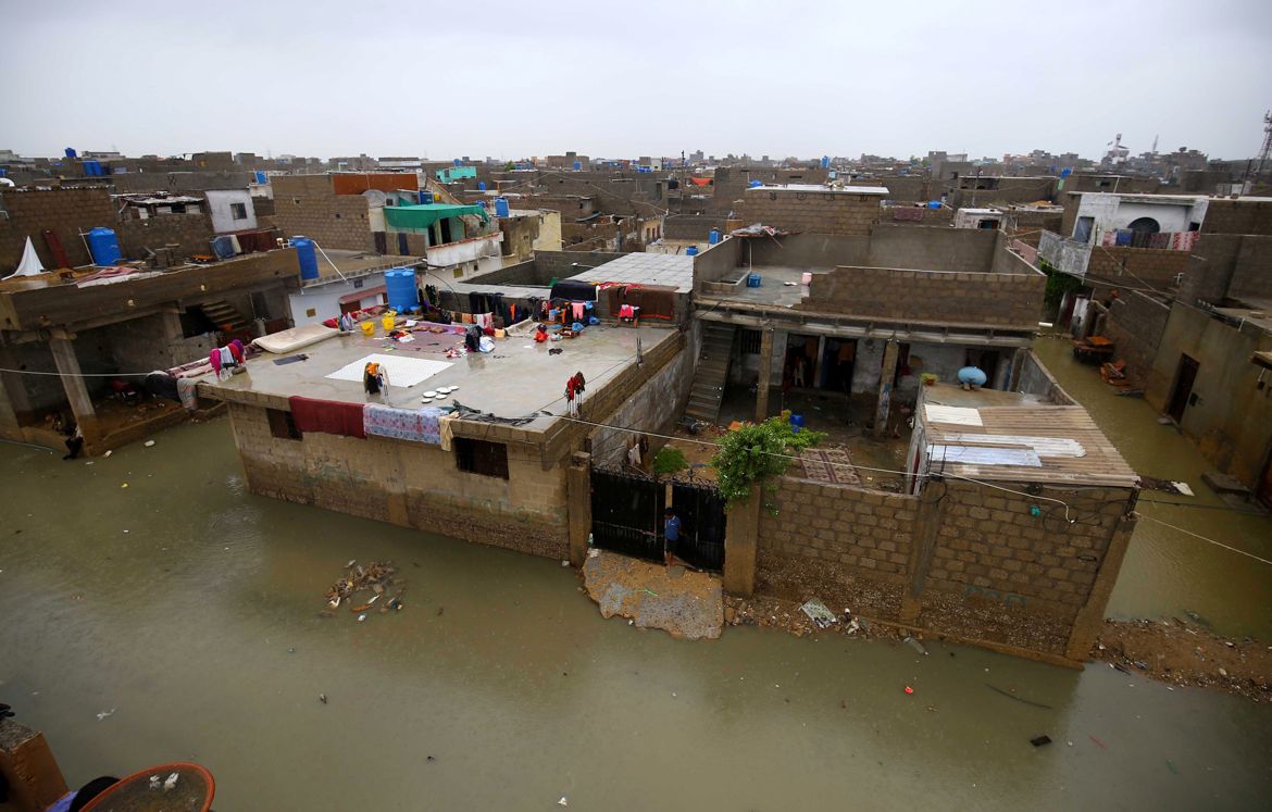 epa08624497 A view of inundated residential area after heavy monsoon rain water in Karachi, Pakistan, 25 August 2020. Heavy monsoon rain flooded several areas of Karachi causing traffic jams and power