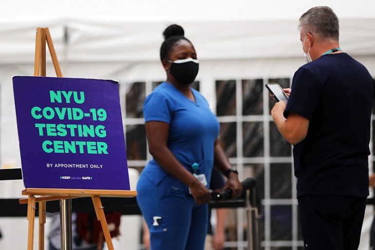 NEW YORK, NEW YORK - AUGUST 25: Students at New York University (NYU) take a Covid-19 test outside of its business school on on August 25, 2020 in New York City. All students arriving back to the camp