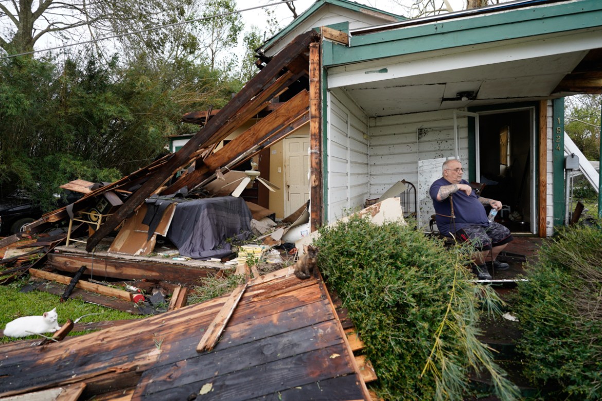 Chris Johnson views destruction at his home on Thursday, Aug. 27, 2020, in Lake Charles, La., after Hurricane Laura moved through the state. Johnson stayed in his home as the storm passed. (AP Photo/G