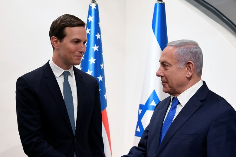 Israeli Prime Minister Benjamin Netanyahu shakes hands with Senior White House advisor Jared Kushner during their meeting in Jerusalem