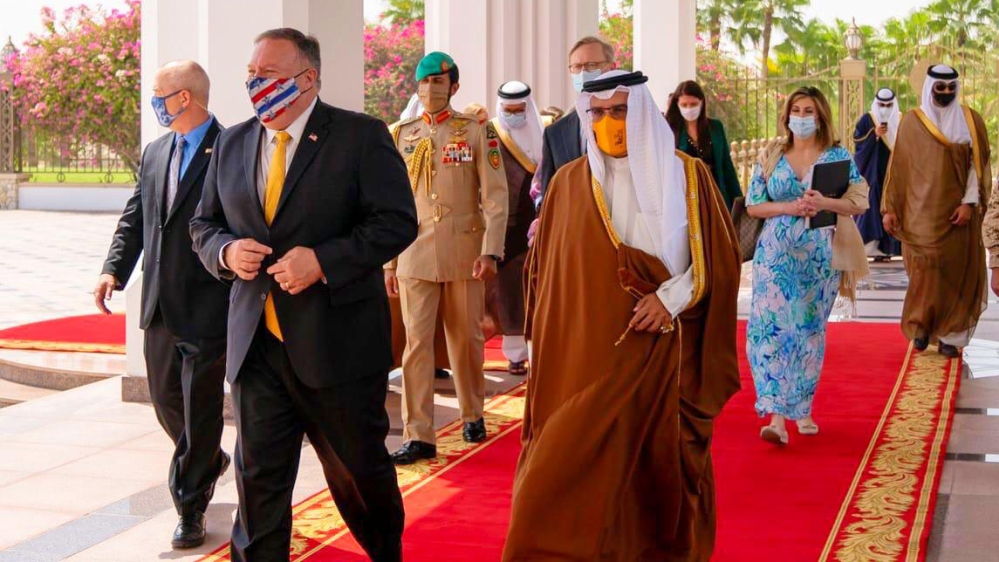 A handout picture released by Bahrain's official news agency (BNA) on August 26, 2020, US Secretary of State Mike Pompeo (C-L) meeting with Bahrain's Crown Prince Salman bin Hamad bin Isa al-Khalifa (