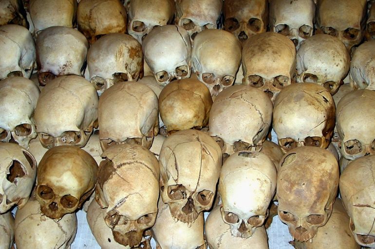 Human skulls are seen in this February 2004 file picture on the floor of the Ntarama church in Rwanda where several hundred people were slaughtered during the tiny central African country''s 1994 genoc