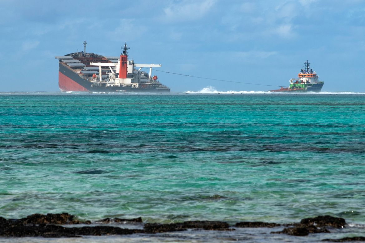 A picture taken on August 15, 2020 near Blue Bay Marine Park, shows the vessel MV Wakashio, belonging to a Japanese company but Panamanian-flagged, that ran aground near Blue Bay Marine Park off the c