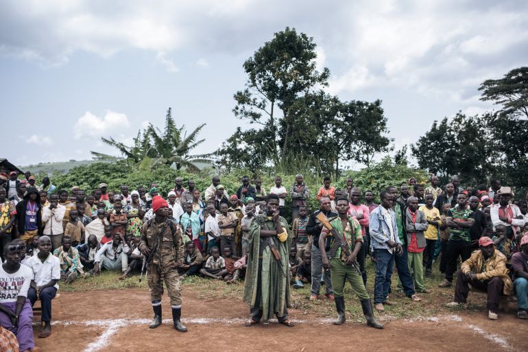 CODECO militiamen and members of the Lendu community