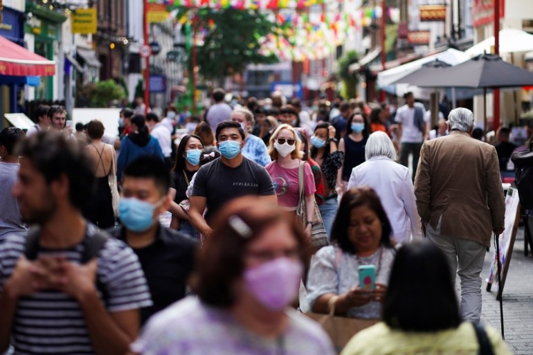 People walk through the Chinatown area, amid the coronavirus disease (COVID-19) outbreak, in London, Britain, September 20, 2020. REUTERS/Henry Nicholls