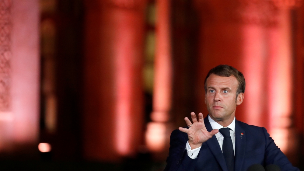 Macron halts 