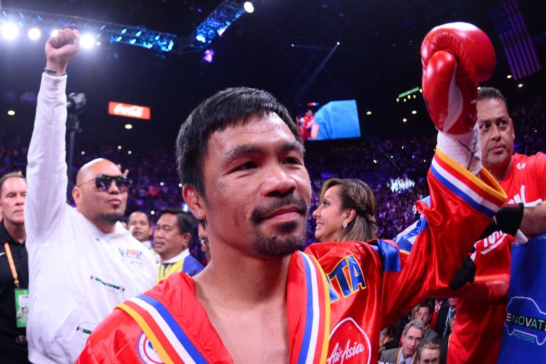 Boxer Manny Pacquiao enters the ring to face Keith Thurman