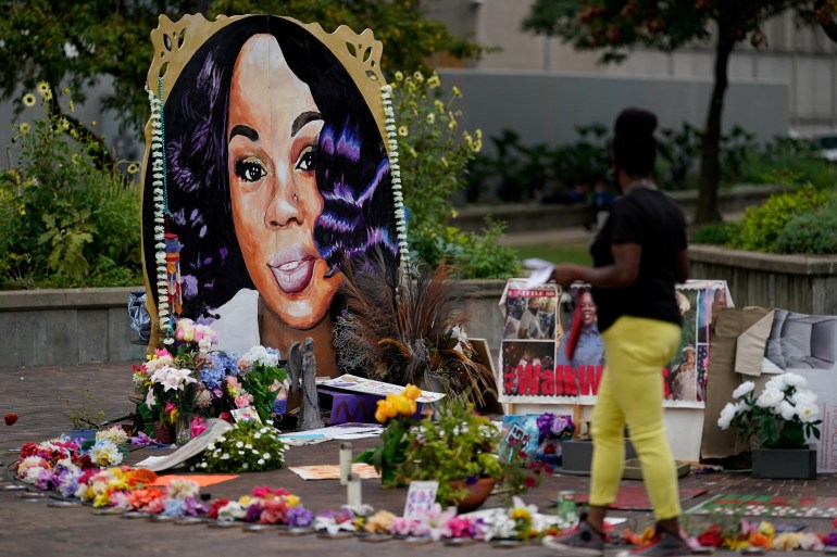 A woman visits the memorial for Breonna Taylor in Louisville, Kentucky, the United States [File: Bryan Woolston/Reuters]