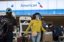 American Airlines check-in counters [Bloomberg]