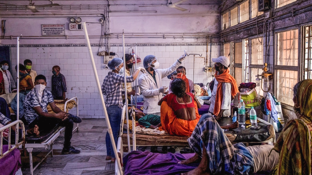 Medical staff treat a patient inside the emergency ward of Jawahar Lal Nehru Medical College and Hospital, during the coronavirus disease (COVID-19) outbreak, in Bhagalpur, Bihar, India, July 27, 2020