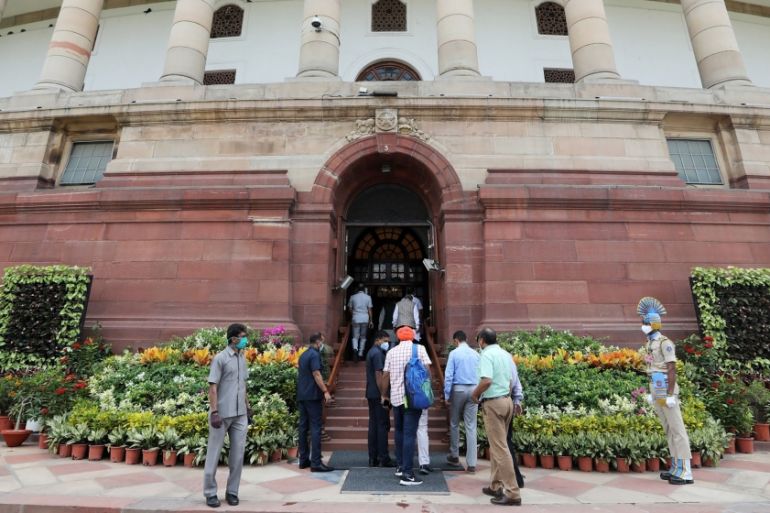 People enter Parliament House in New Delhi, India, on Sunday, Sept. 13, 2020. Indian lawmakers returned to the nation''s parliament for the first time since the start of the pandemic with Prime Ministe