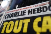 The French satirical magazine Charlie Hebdo is seen at a newspapers kiosk in Paris on the opening day of the trial of the January 2015 Paris attacks on September 2, 2020 [Reuters/Christian Hartmann]